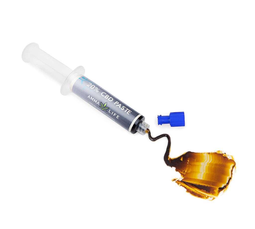 Pure CBD paste extract by Amma Life for optimal potency - 20% CBD range. Open, showing the CBD paste extract spread out.