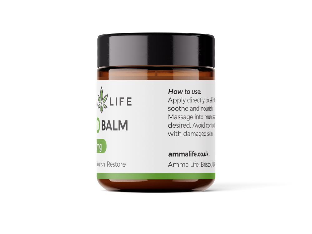 
                  
                    Amma Life Balm jar with How to Use label on a white background
                  
                